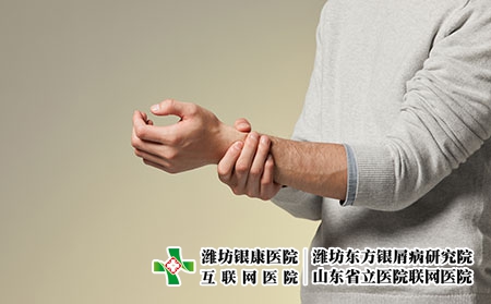 攝圖網(wǎng)_501528683_青年男性手腕疼痛（企業(yè)商用）